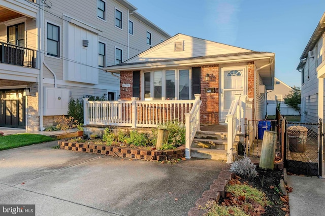 view of front of property with a balcony