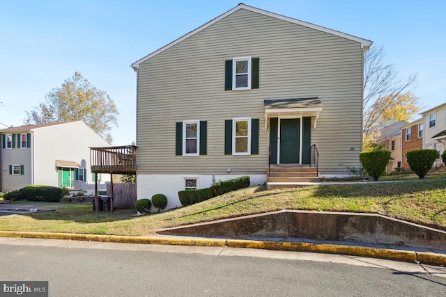 view of front of home with a front yard