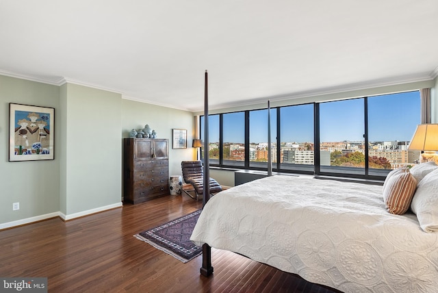 bedroom featuring hardwood / wood-style floors and ornamental molding