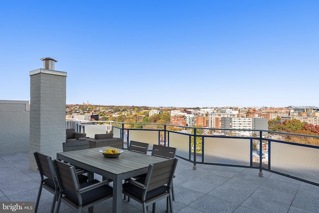 view of patio / terrace with a balcony