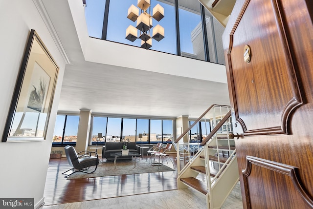 stairs with hardwood / wood-style floors