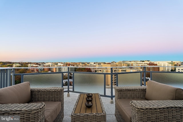 view of balcony at dusk