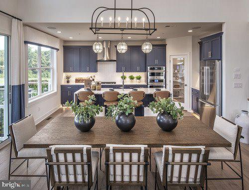 dining room featuring a chandelier and hardwood / wood-style flooring