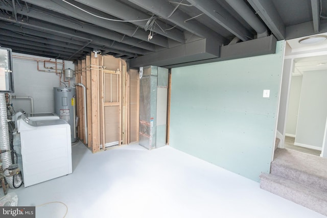 basement with washer / dryer and electric water heater