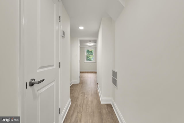 hallway featuring light hardwood / wood-style flooring