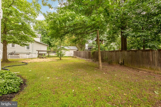 view of yard featuring a deck