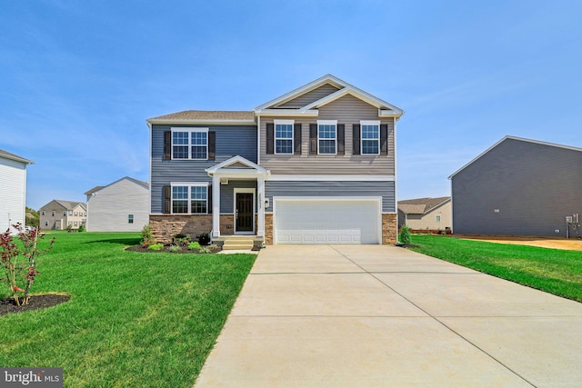 view of front of property with a front lawn and a garage