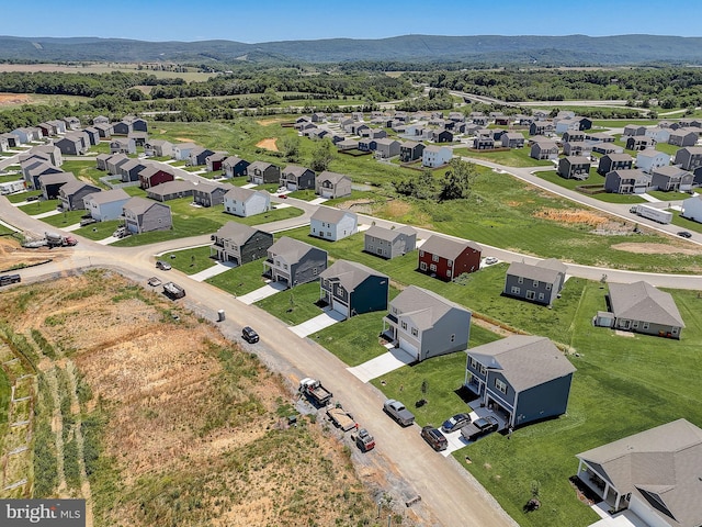 bird's eye view with a mountain view