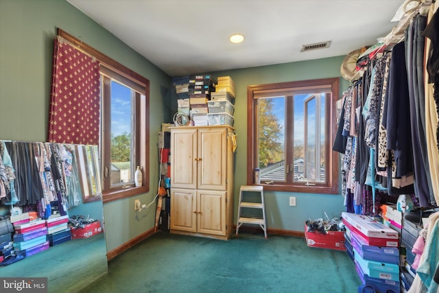 interior space with dark colored carpet