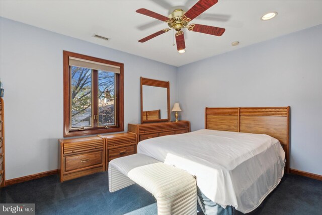 carpeted bedroom with ceiling fan