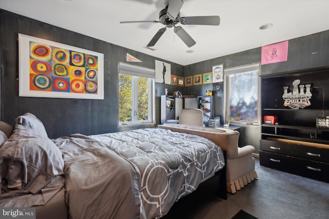 carpeted bedroom with ceiling fan