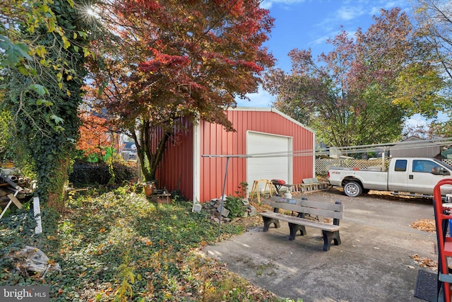 view of outbuilding with a garage