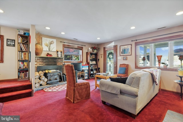 carpeted living room with a wealth of natural light