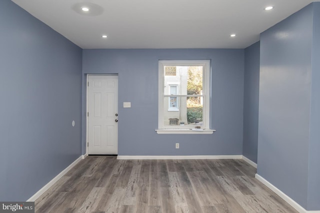 interior space with hardwood / wood-style flooring