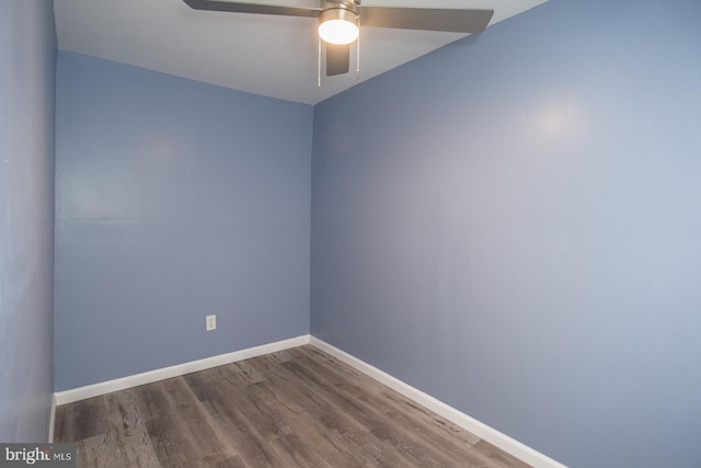 unfurnished room with hardwood / wood-style floors and ceiling fan