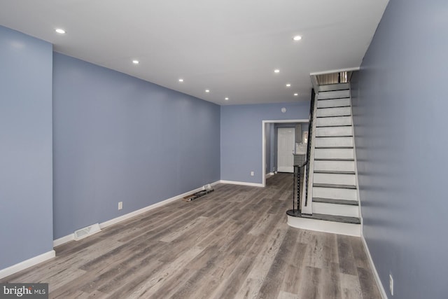 interior space with hardwood / wood-style flooring