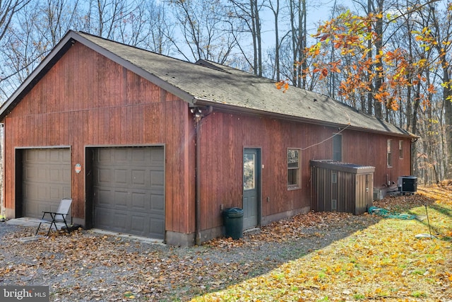 view of side of property featuring central AC unit