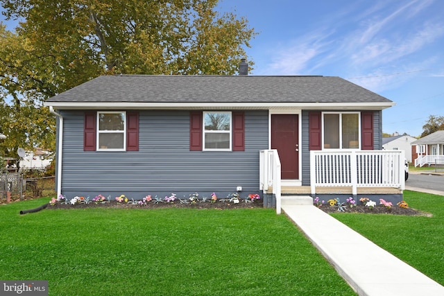 view of front of home with a front yard