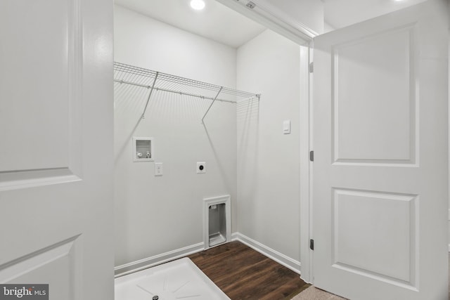 laundry area with electric dryer hookup, washer hookup, and dark hardwood / wood-style floors