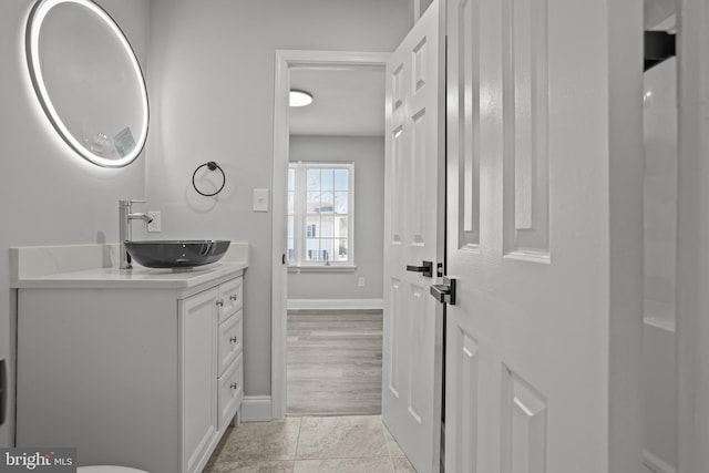 bathroom with vanity and tile patterned floors