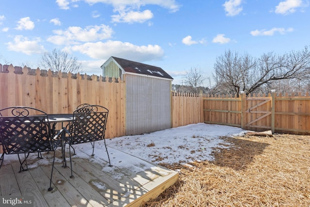 deck featuring a shed