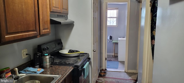 kitchen featuring sink and black range with electric stovetop