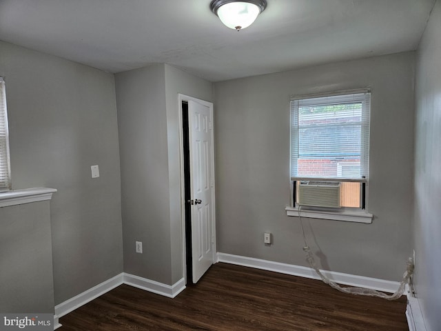 empty room featuring dark hardwood / wood-style floors