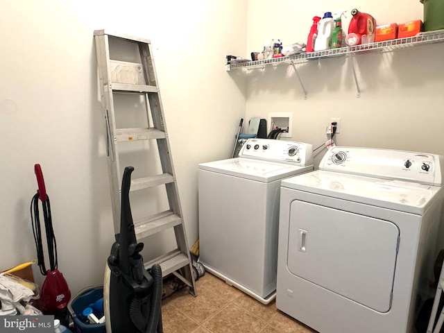 washroom with washer and clothes dryer