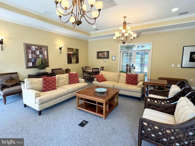 carpeted living room featuring a raised ceiling, crown molding, and a chandelier