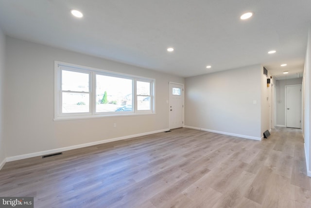 empty room featuring light hardwood / wood-style floors