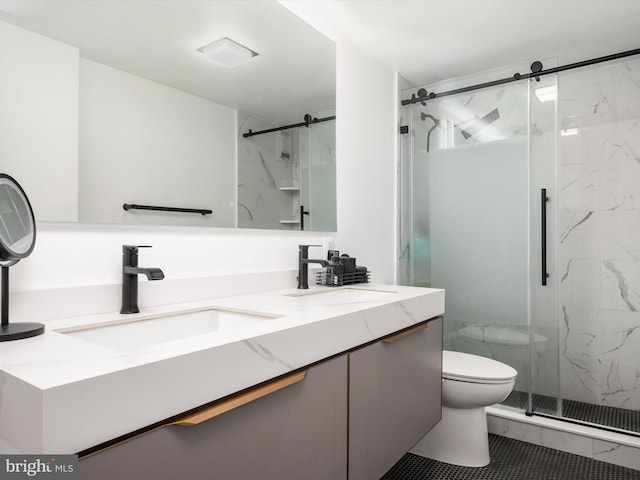 4201 Cathedral Ave NW Unit T10E, Washington, DC 20016 - bathroom featuring a sink, double vanity, toilet, and a marble finish shower
