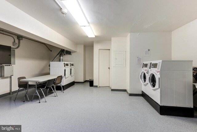 4201 Cathedral Ave NW Unit T10E, Washington, DC 20016 - common laundry area featuring baseboards and washer and dryer