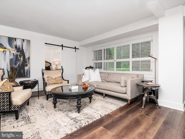 4201 Cathedral Ave NW Unit T10E, Washington, DC 20016 - living area with a barn door, baseboards, and wood finished floors