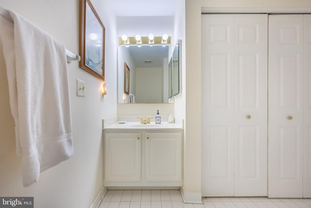 bathroom featuring tile patterned floors and vanity