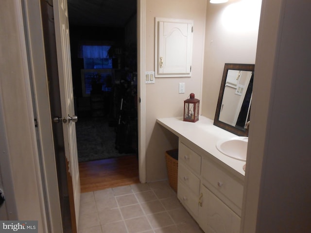 bathroom featuring vanity and hardwood / wood-style flooring