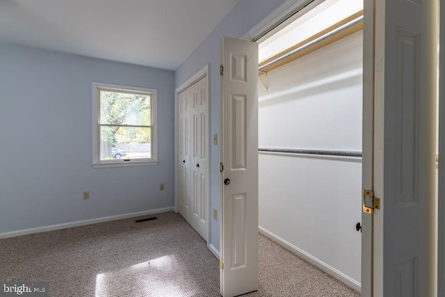 interior space with light carpet