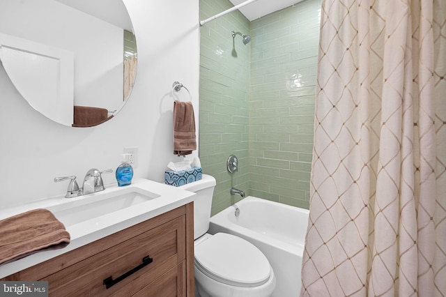 full bathroom featuring toilet, shower / tub combo, and vanity