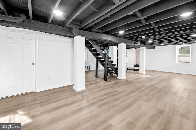 basement with light wood-type flooring