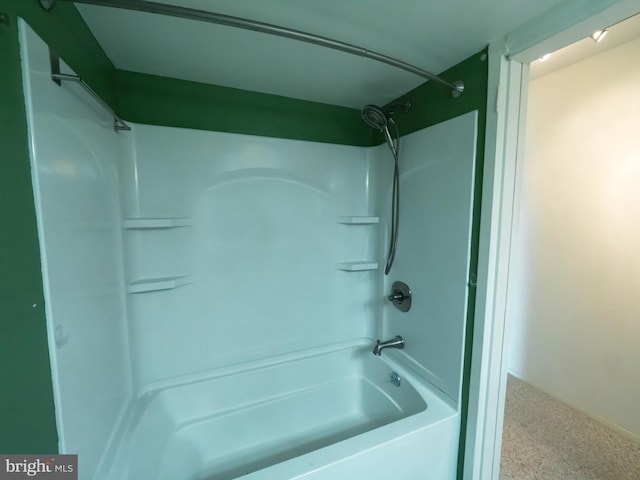 bathroom featuring  shower combination