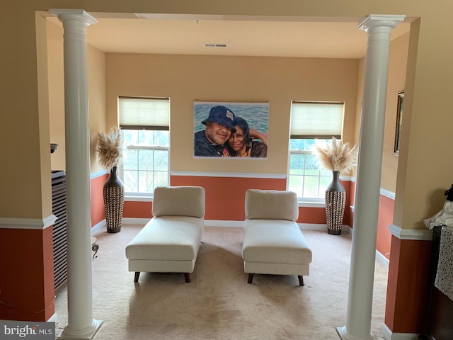 sitting room with light carpet