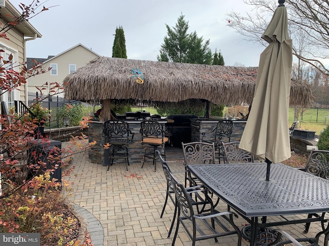 view of patio / terrace with exterior bar