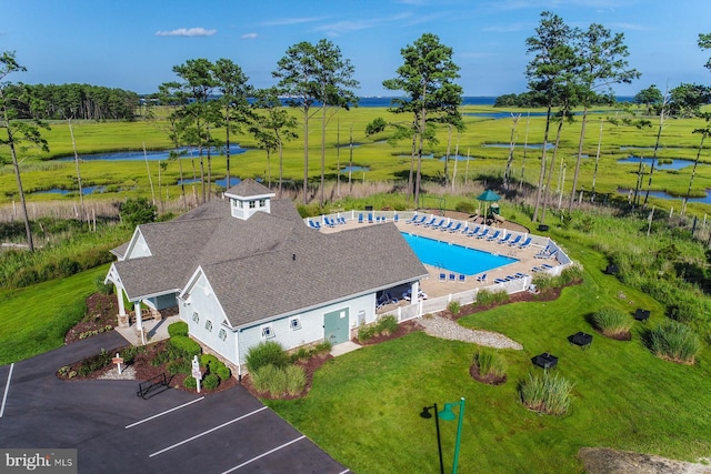 bird's eye view with a rural view and a water view