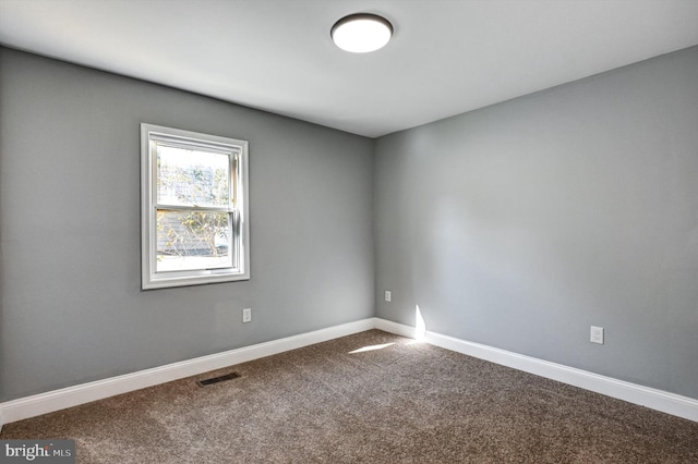 view of carpeted spare room