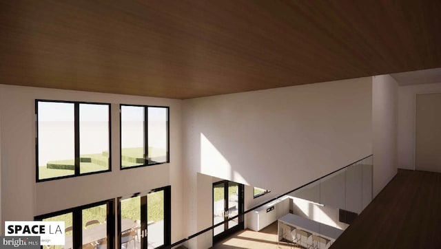 staircase with hardwood / wood-style floors and wooden ceiling