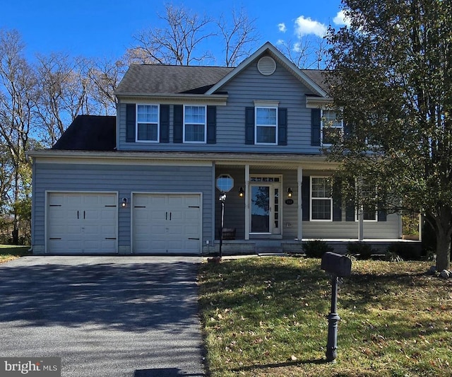 222 Dinwiddie Way, Kearneysville, WV 25430 - view of front of home with asphalt driveway, a porch, a garage, and a front yard