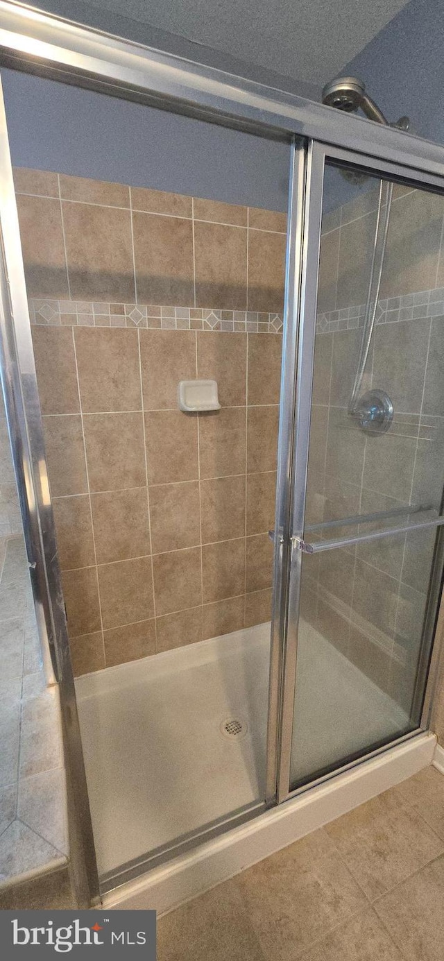 222 Dinwiddie Way, Kearneysville, WV 25430 - full bath featuring a stall shower and tile patterned flooring