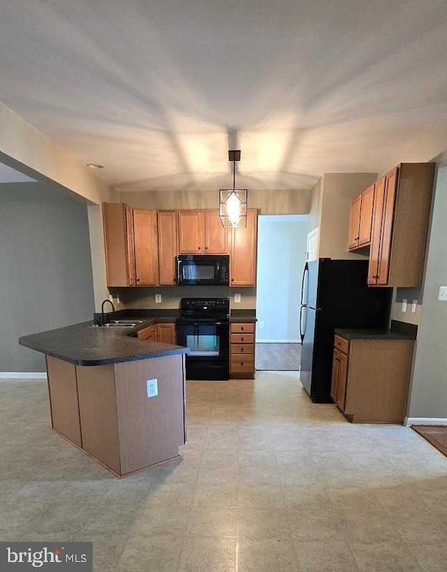 222 Dinwiddie Way, Kearneysville, WV 25430 - kitchen with black appliances, dark countertops, a peninsula, a sink, and baseboards