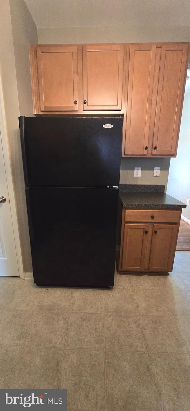 222 Dinwiddie Way, Kearneysville, WV 25430 - kitchen with freestanding refrigerator and dark countertops