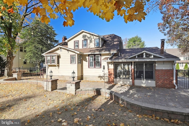 rear view of house featuring a patio area