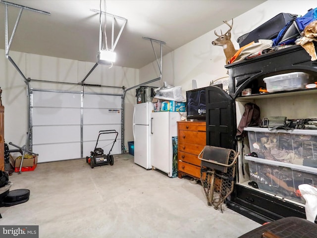 garage featuring white fridge